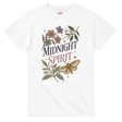 A white short-sleeve crewneck t-shirt featuring a vintage-style graphic on the front with the words 'MIDNIGHT SPIRIT' surrounded by flowers, leaves, and a moth.