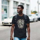 A man wearing a black t-shirt with a geometric design, standing on a street.