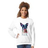 A girl wearing a white sweatshirt featuring a vibrant polygon-style dog portrait with the text “P.U.G.” below.