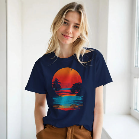 Woman wearing a navy blue t-shirt with a colorful sunset design.