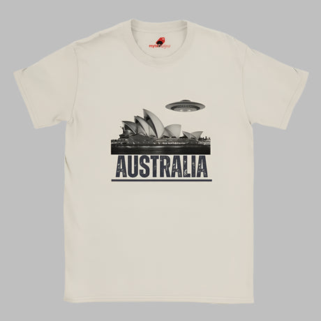 Front view of a soft casual tee showing the Sydney Opera House sails with a sleek spaceship graphic orbiting overhead, printed on ultra-soft Gildan 64000 cotton.