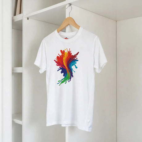 White t-shirt with a colorful abstract design on a hanger against a white wall.