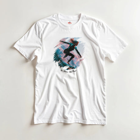 White T-shirt with a graphic design of a girl surfing on a colorful background, displayed on a light gray surface.