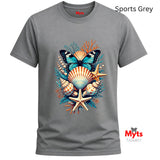 A gray short-sleeve t-shirt with a colorful graphic of a butterfly, seashells, and starfish. The shirt is shown on a plain white background with 'Sports Grey' text in the top right and a 'Myts Designs' logo in the bottom right.