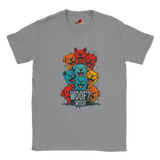 A flat lay sports grey T-shirt featuring a vibrant graphic of cartoon puppies stacked in red, orange, blue, and yellow hues, with the playful text “WOOF? WOOF” below the design.