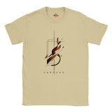 A Sand crewneck t-shirt with a central graphic of a stylized letter 'S' in black, brown, and orange, with the word 'UNBOUND' printed below it. The inner collar shows the red 'Myts' brand logo.