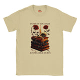 Sand t-shirt with a graphic design of books, roses, and text on a white background