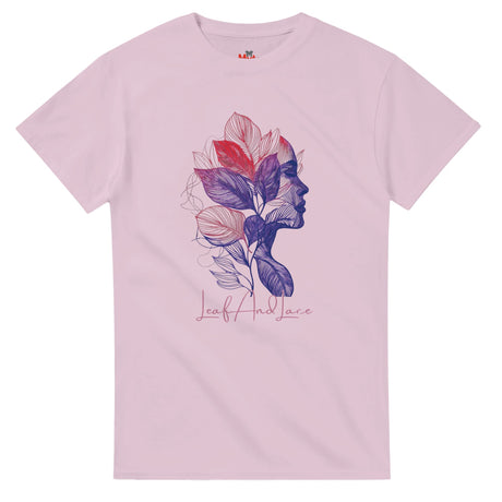 Pink t-shirt with a colorful leaf and face design on a white background