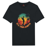 Black  Vintage style t-shirt with a graphic of a golfer and palm trees at sunset, with text 'It's That Simple', on a white background.