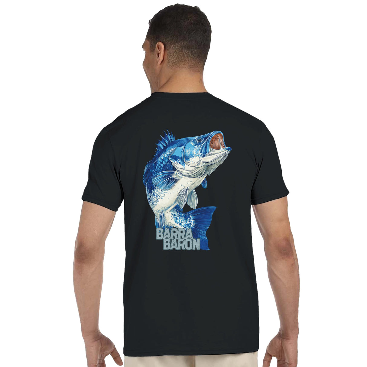 Man wearing a black t-shirt with a blue fish graphic on the back, brand 'Barb & Bar' visible.