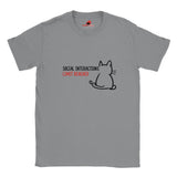 “White T-shirt laid flat with a minimal line art cat and text reading ‘Social Interactions Limit Reached’ in bold black and red font, humorous introvert design from MytsDesigns.com”

