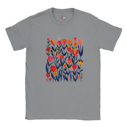 Sports Grey unisex T‑shirt featuring a minimalist poppy design in vibrant reds, pinks, and greens—with clean lines and botanical elegance—against a white background. Soft cotton tee shown flat for clarity.
