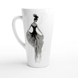 A white ceramic latte mug featuring a black and gray watercolor-style illustration of a woman in a flowing dress, shown on a clean white background.