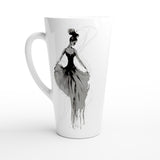 A white ceramic latte mug featuring a black and gray watercolor-style illustration of a woman in a flowing dress, shown on a clean white background.