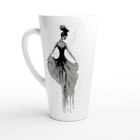 A white ceramic latte mug featuring a black and gray watercolor-style illustration of a woman in a flowing dress, shown on a clean white background.