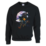 Black sweatshirt with a colorful graphic of a witch on a moon and stars design.