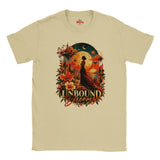 Sand-coloured T-shirt with Unbound Dreams celestial landscape, floating castles and vibrant floral graphic.