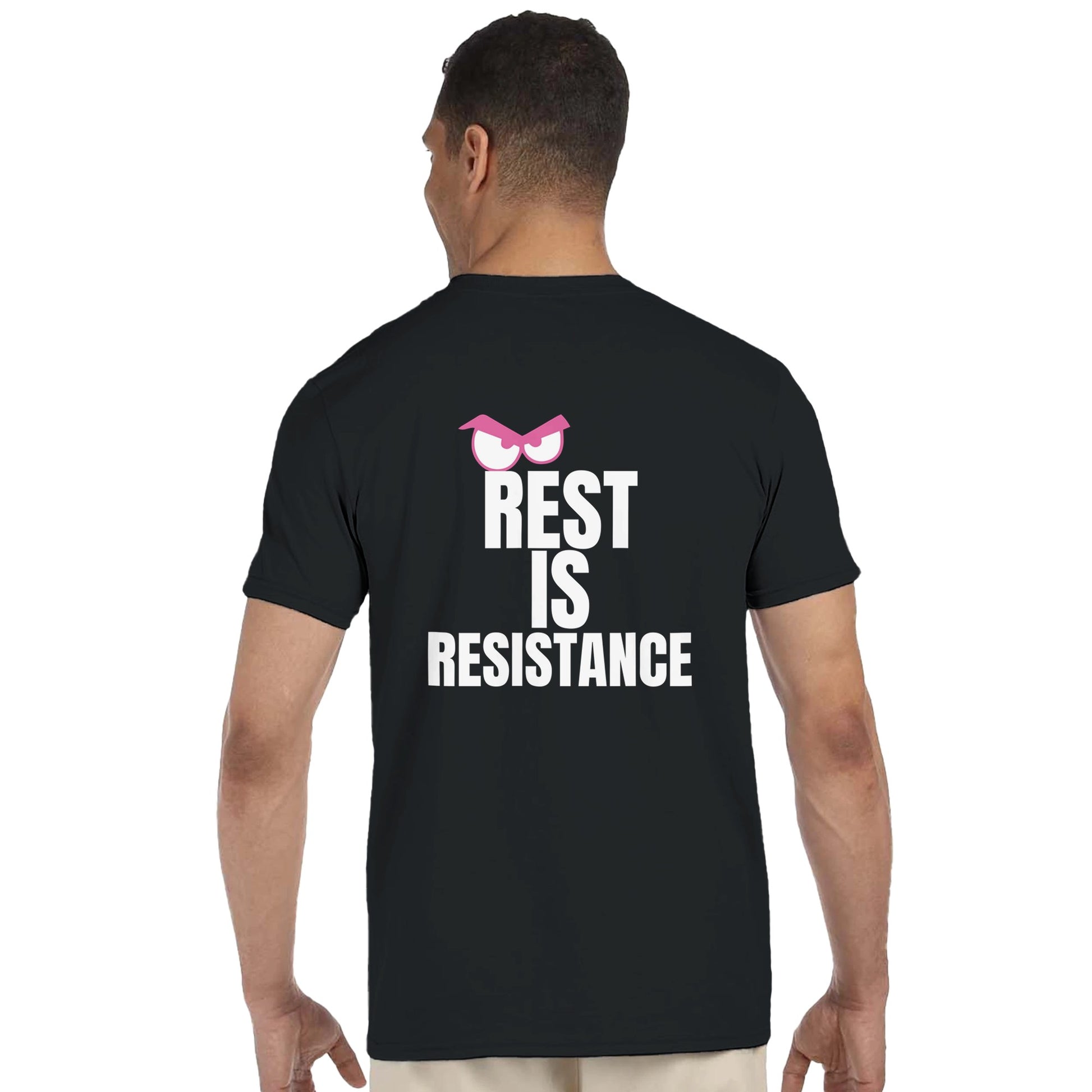 A person wearing a black t-shirt with 'REST IS RESISTANCE' text on the back.
