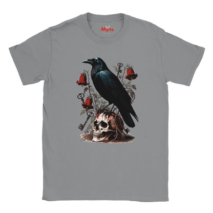 A gray crewneck t-shirt featuring a gothic-style graphic print of a black raven perched on a skull, surrounded by red bells, keys, and roses. The brand name 'Mits' is printed in red on the inside neck label.