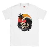 White t-shirt with a graphic design of a wave, palm tree, and 'Ride the Wave' text on a white background.