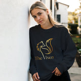Person wearing a black sweatshirt with 'Japan' design leaning against a wall.