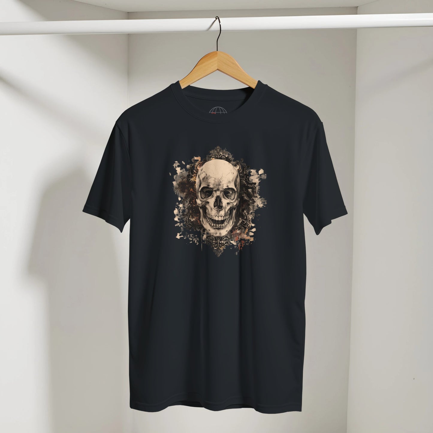 Black t-shirt with a skull design on a hanger against a plain background