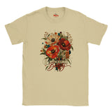 A sand crewneck t-shirt featuring a graphic print of red and cream poppies with the words 'Unbound Beauty' in stylized script, displayed on a clean white background.
