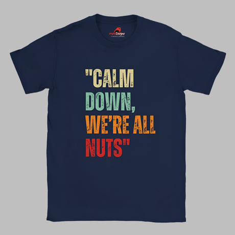 A Flat lay view of a navy colored retro-style casual tee featuring bold distressed vintage typography reading “Relax — We’re All Weird Here,” printed on ultra-soft Gildan 64000 cotton.

