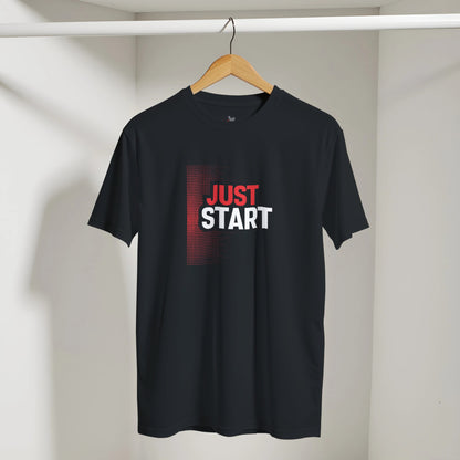 Black t-shirt with 'JUST START' text on a hanger against a neutral background