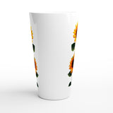 A tall white, tapered glass with a repeating sunflower pattern on the sides, shown against a plain white background.