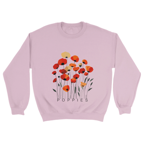 A Pink sweatshirt featuring a minimalist poppy flower design. The graphic displays red, orange, and muted gold poppies with slender stems and leaves, and the word “POPPiES” printed beneath. The cozy, casual outfit has a soft, modern aesthetic ideal for floral and nature-inspired fashion.