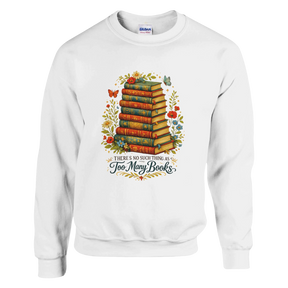 White sweatshirt featuring vintage stacked books artwork with floral accents and “There’s No Such Thing As Too Many Books” text.