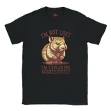 Black t-shirt with a graphic of a Wombat and text 'I'm not lost, I'm exploring aggressively' on a white background.