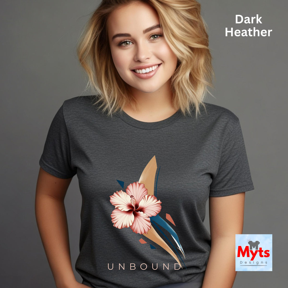 Woman modelling a Dark Heather UNBOUND hibiscus floral T-shirt against a neutral studio background.