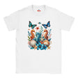 A white graphic T-shirt featuring three colourful seahorses, blue butterflies, tropical flowers, starfish and seashells in a vibrant ocean wildlife design.