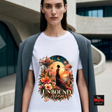 Woman modelling a white Unbound Dreams graphic tee with a grey blazer in a modern architectural setting.
