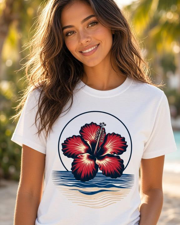 White tropical hibiscus flower graphic T-shirt featuring a vibrant red bloom, navy circular outline and stylised blue and sandy-gold ocean waves.