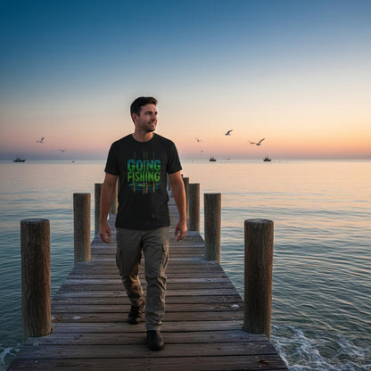 A man walking on a dock at sunset, wearing a 'Going Fishing' t-shirt.