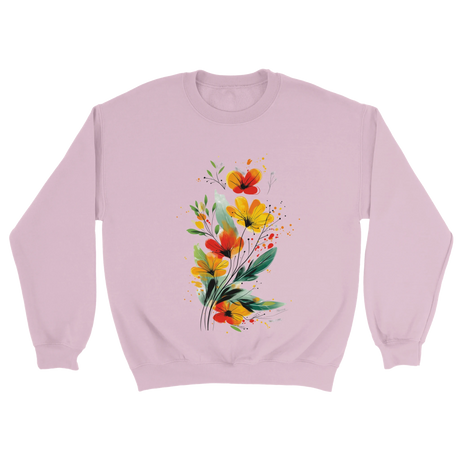 A light pink sweatshirt featuring an artistic watercolor floral design with red, yellow, and orange wildflowers accented by lush green leaves and delicate splatters.

