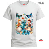A white graphic T-shirt featuring three colourful seahorses, blue butterflies, tropical flowers, starfish and seashells in a vibrant ocean wildlife design.