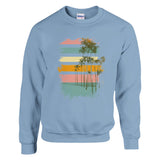 Light blue sweatshirt with a colorful palm tree design on a white background