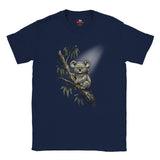 A navy blue short-sleeve crewneck t-shirt featuring a graphic print of a koala sitting on a tree branch with eucalyptus leaves, set against a plain white background.