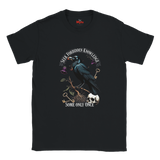 Black t-shirt with a crow and text design on a white background