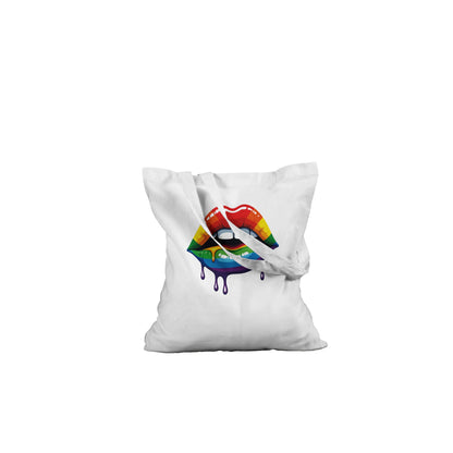 White pillow with colorful lips design on a white background