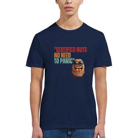 A young woman wearing a navy colored Retro-style casual tee featuring bold vintage script reading “Certified Nuts, No Need to Panic” in distressed lettering, printed on ultra-soft Gildan 64000 cotton.

