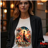 A woman wearing a white Unbound Dreams floral fantasy graphic T-shirt beneath an open black blazer.