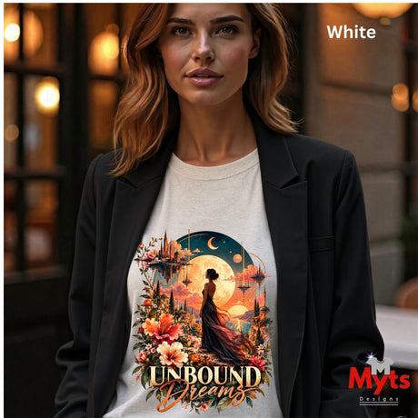 A woman wearing a white Unbound Dreams floral fantasy graphic T-shirt beneath an open black blazer.