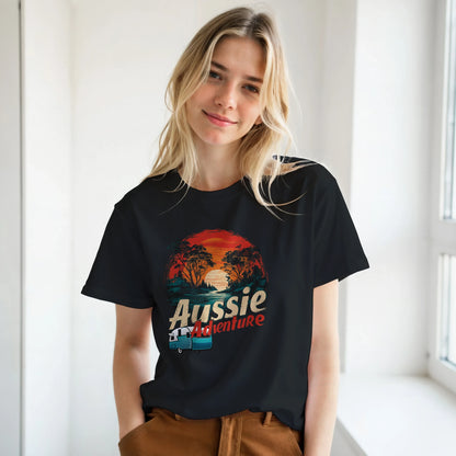 Person wearing a black t-shirt with 'Aussie Adventure' design in a bright room.