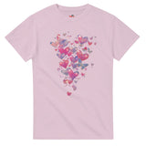Pink t-shirt with colorful heart design on a white background