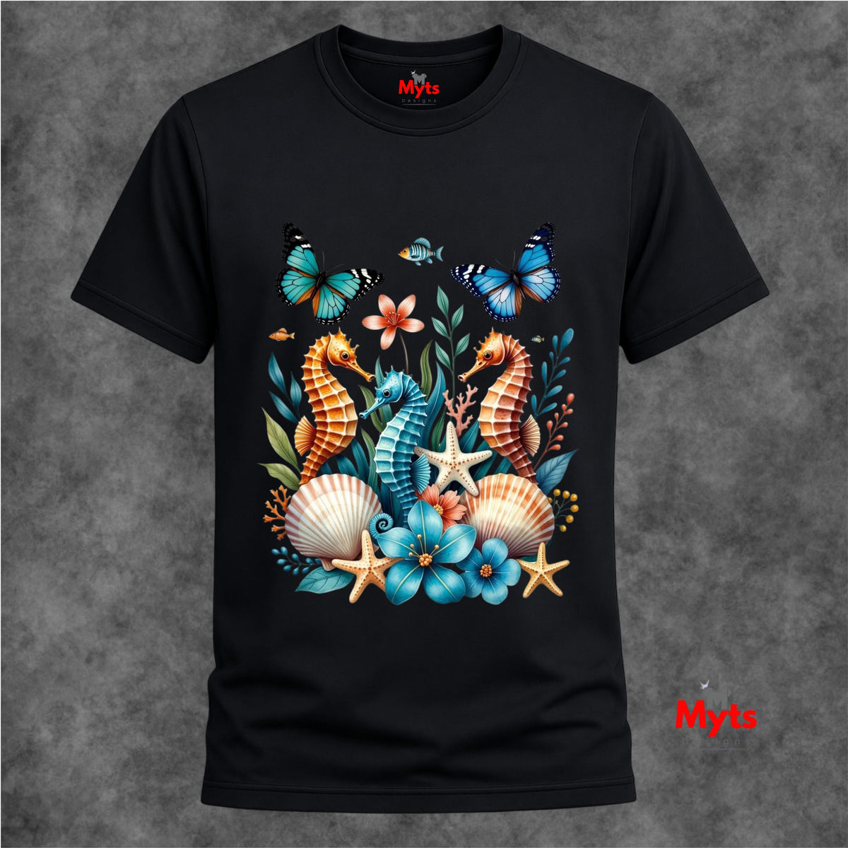 A black graphic T-shirt featuring three colourful seahorses, blue butterflies, tropical flowers, starfish and seashells in a vibrant ocean wildlife design.